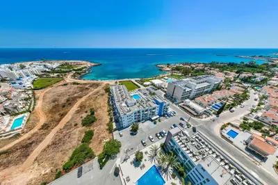 an aerial view of a city and the ocean at Apartment Victoria in Protaras
