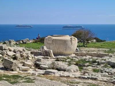 a large stone pot sitting on top of a hill at Alania Sea View Apartment in Limassol