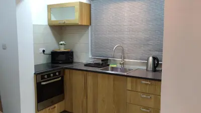 a kitchen with a sink and a stove at Luxury Apartment Ayia Napa Center in Ayia Napa