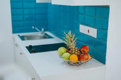 a bowl of fruit on a counter in a bathroom at Stephanie Studios in Larnaka