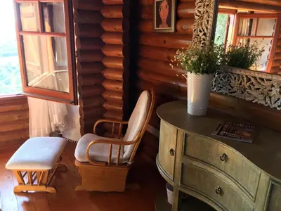 a room with a table and a chair and a desk at Anti Onirou in Flasou
