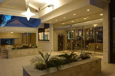 a lobby of a building with a star on the ceiling at Senator Hotel Apartments - Adults Only in Ayia Napa