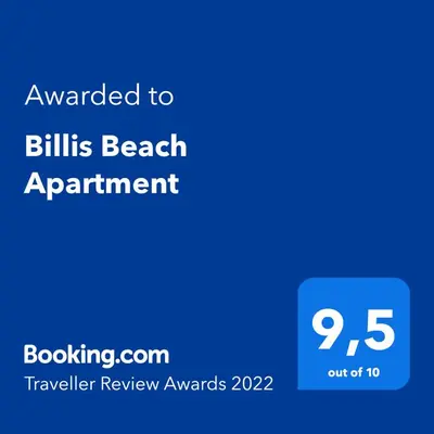 a blue sign with the text awarded to bills beach appointment at Billis Beach Apartment in Limassol