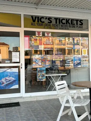 a store window with a table and chairs in it at Apartment Helena in Paralimni