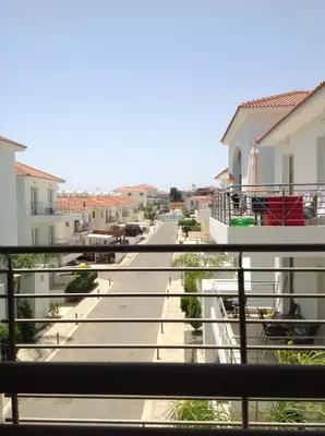a view from the balcony of a apartment building at Apartment Helena in Paralimni