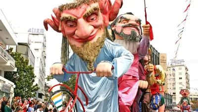 a group of people dressed in costumes in a parade at Artemis Boutique Apartment 1 in Limassol