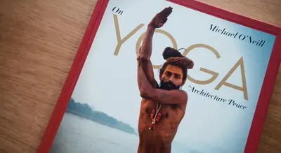 a book with a picture of a man on the cover at Aelia Wellness Retreat in Nicosia