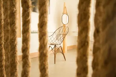 a chair in a room with a mirror at Aelia Wellness Retreat in Nicosia