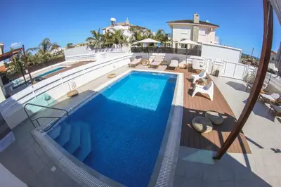 an overhead view of a swimming pool on a house at Villa Alexandra in Ayia Napa