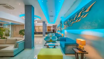 a waiting room at a hospital with blue ceilings at Stamatia Hotel in Ayia Napa