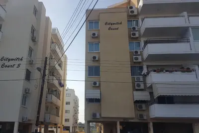 a view of two buildings in a city at Makenzy Apartment in Larnaka
