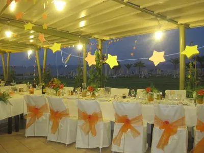 a marquee with tables with white chairs and stars at Polyxenia Isaak Villa Heaven Pernera in Protaras