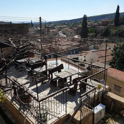 a building under construction with a view of a city at Vasilopoulos House in Tochni