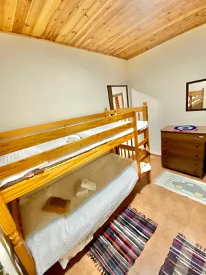 a bedroom with two bunk beds in a room at Saint Nicholas heights in Chakistra