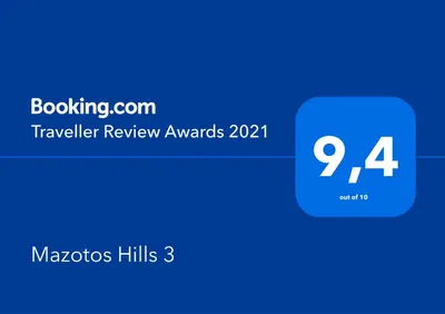 a blue box with the text traveler review awards at Mazotos Hills 3 in Mazotos