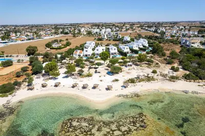 an aerial view of a beach with a resort at Thalassines Villas in Ayia Napa