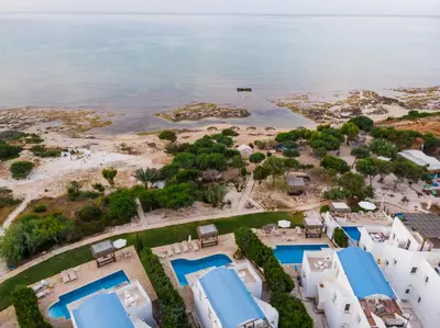 an aerial view of a resort near the ocean at Thalassines Villas in Ayia Napa