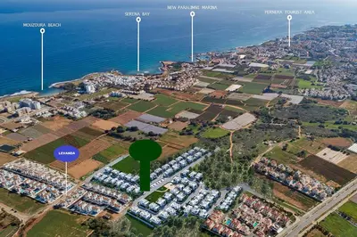 an aerial view of a parking lot next to the ocean at Villa Maris in Protaras