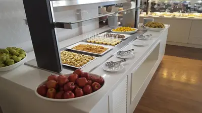 a buffet line with many different types of food at Aktea Beach Village in Ayia Napa