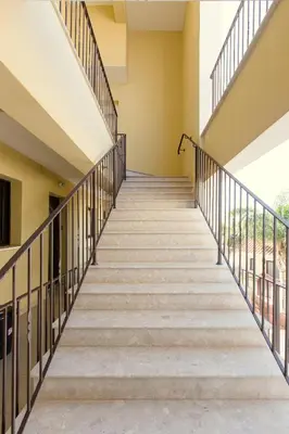 a flight of stairs in a building at Tranquil Kyklades BC6, WALK to BEACH in Paralimni