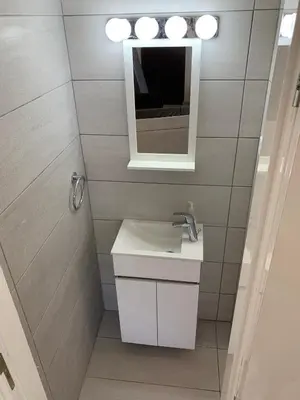 a bathroom with a sink and a mirror at Villa Elena in Ayia Napa