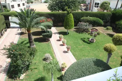 an aerial view of a garden with trees and bushes at Residence L' Aubrais in Limassol