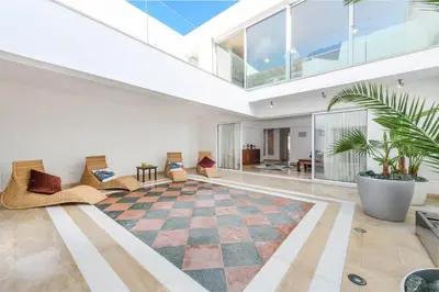 an open living room with a large glass ceiling at Villa Nausica in Protaras