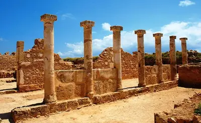 a row of columns in an ancient building at Poseidon Boutique Apartment 1 in Limassol