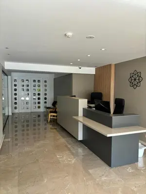 an office with a reception desk and a lobby at Sunflower Hotel Apartments in Larnaka