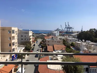 a view of a city from a balcony at Sunflower Hotel Apartments in Larnaka