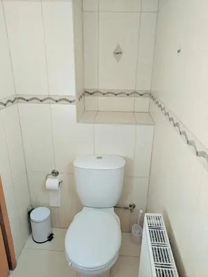 a small bathroom with a white toilet in it at ANTHORINA VILLA 9 in Protaras
