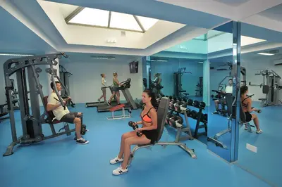 a group of people in a gym at Okeanos Beach Boutique Hotel in Ayia Napa