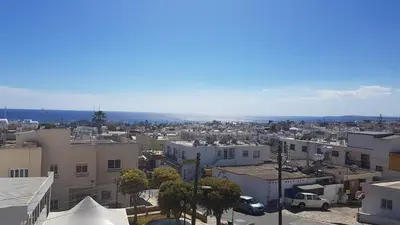 an aerial view of a city with buildings at Pomelo Apartments in Ayia Napa
