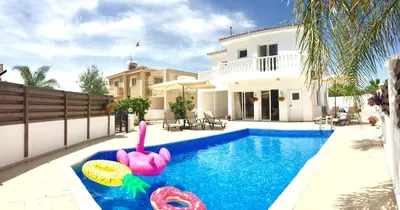 a pool in a house with a pool noodle in the middle at Katerina in Ayia Napa