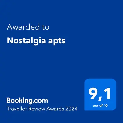 a blue screen with the text awarded to nostalgia apps at Nostalgia apts in Limassol