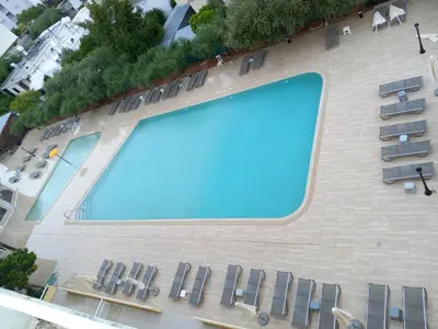 an overhead view of a swimming pool on a building at Sunquest Gardens Holiday Resort in Limassol