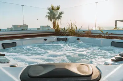 a hot tub on the roof of a building at Vivo Mare Beachfornt Villas - Azure in Ayia Napa