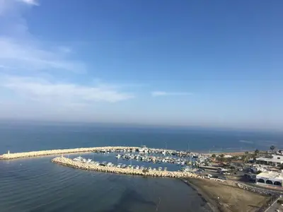 an aerial view of a marina with boats in the water at Serenity by the sea in Larnaka