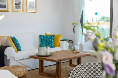 a living room with a white couch and a coffee table at Chris Le Mare Luxury Villa in Protaras