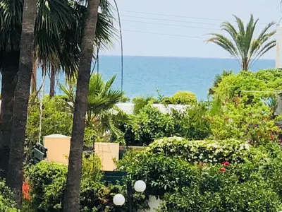 a view of the ocean from a resort at Kypkeys Apartments in Voroklini