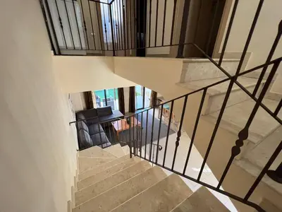 an overhead view of a staircase in a house at Kapparis town house in Paralimni