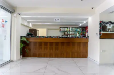 a bar in the lobby of a building at Mariandy Hotel in Larnaka