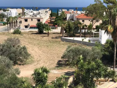 an aerial view of a city with houses and trees at Kasapis Apts in Larnaka