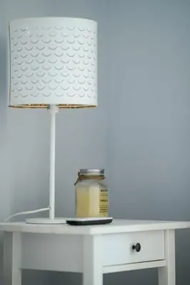 a white desk with a jar of honey on it at Anemomylos guesthouse in Paralimni
