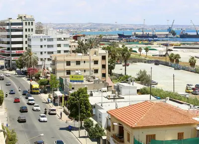 an aerial view of a city with cars on a street at Lazaros Centre Apartment in Larnaka