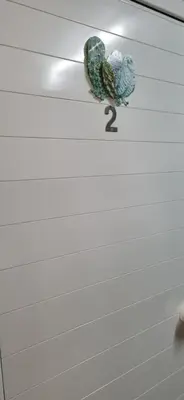 a drawing of two birds on the side of a door at Hermes complex1 paralimni in Paralimni