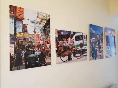 a group of pictures of a street with people riding bikes at NEX Hostel in Nicosia