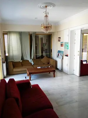 a living room with a couch and a table at NEX Hostel in Nicosia