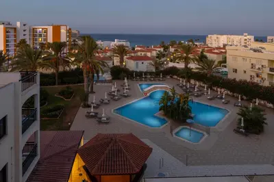an aerial view of a resort with two pools at Seagull Hotel Apartments in Protaras