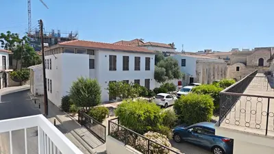 a view of a city with cars parked on a street at St Lazarus City Hotel in Larnaka